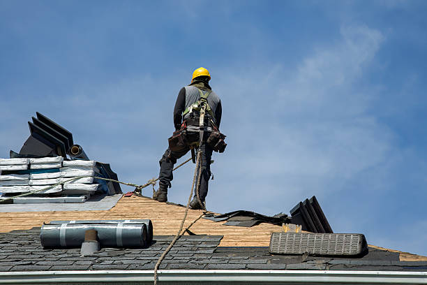 Professional Gutter Installation technician working in Baldwin Place, NY
